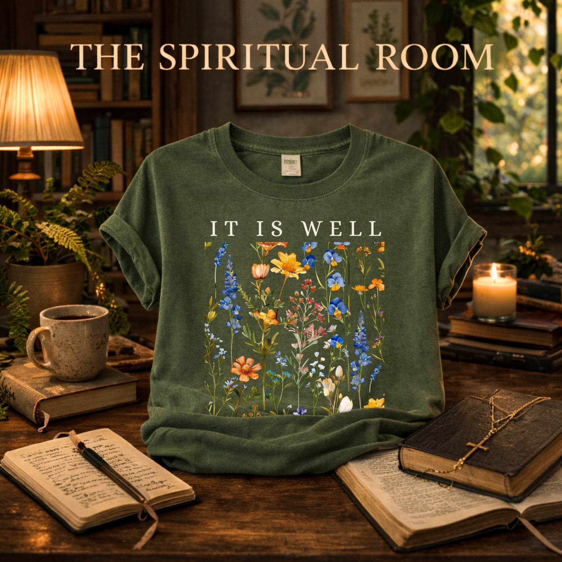 Christian wildflower graphic t-shirt on moss green Comfort Colors shirt with Bible and cross necklace – Spiritual Room collection.
