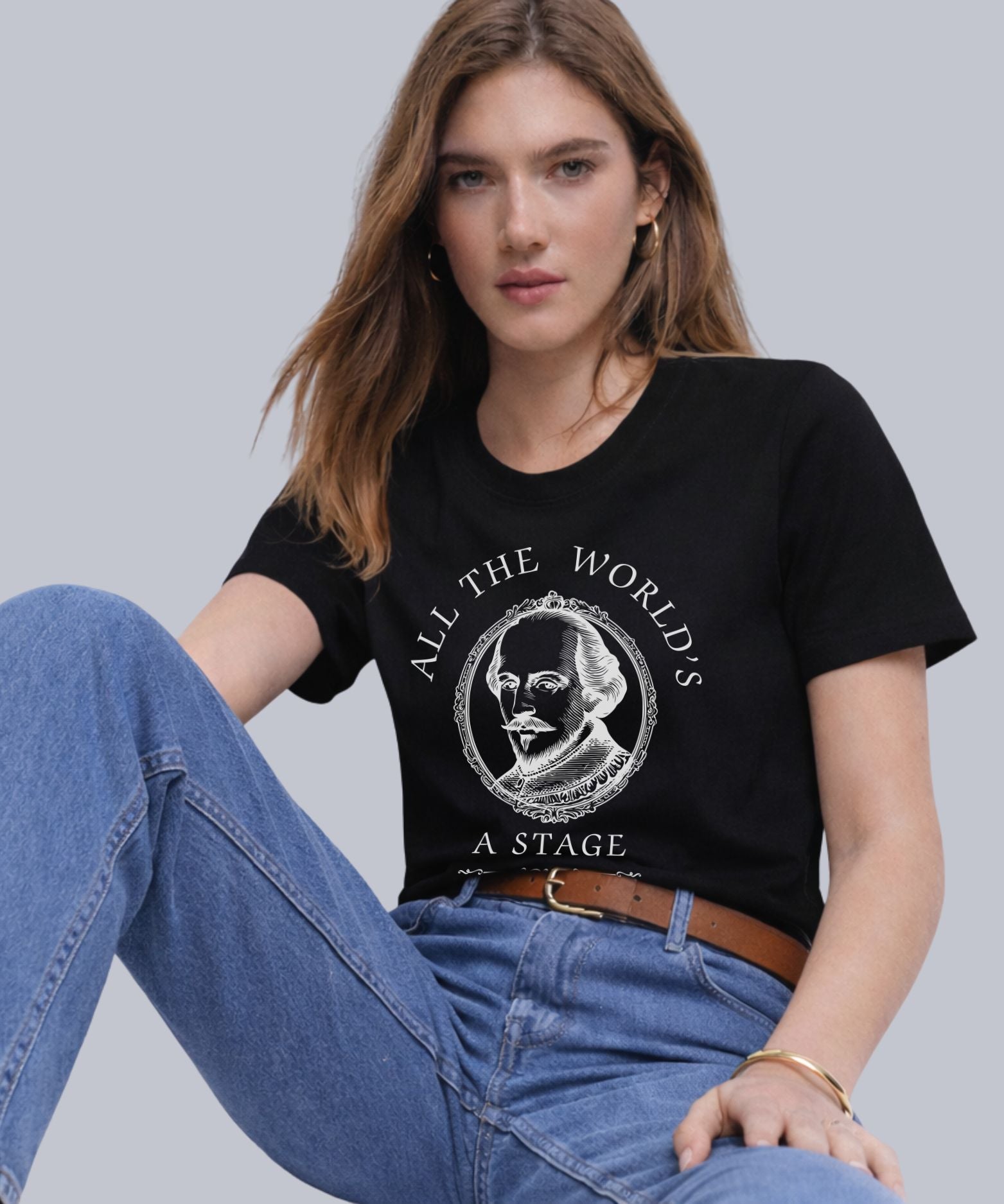 Woman wearing black All the World’s a Stage Shakespeare quote t-shirt with vintage portrait design
