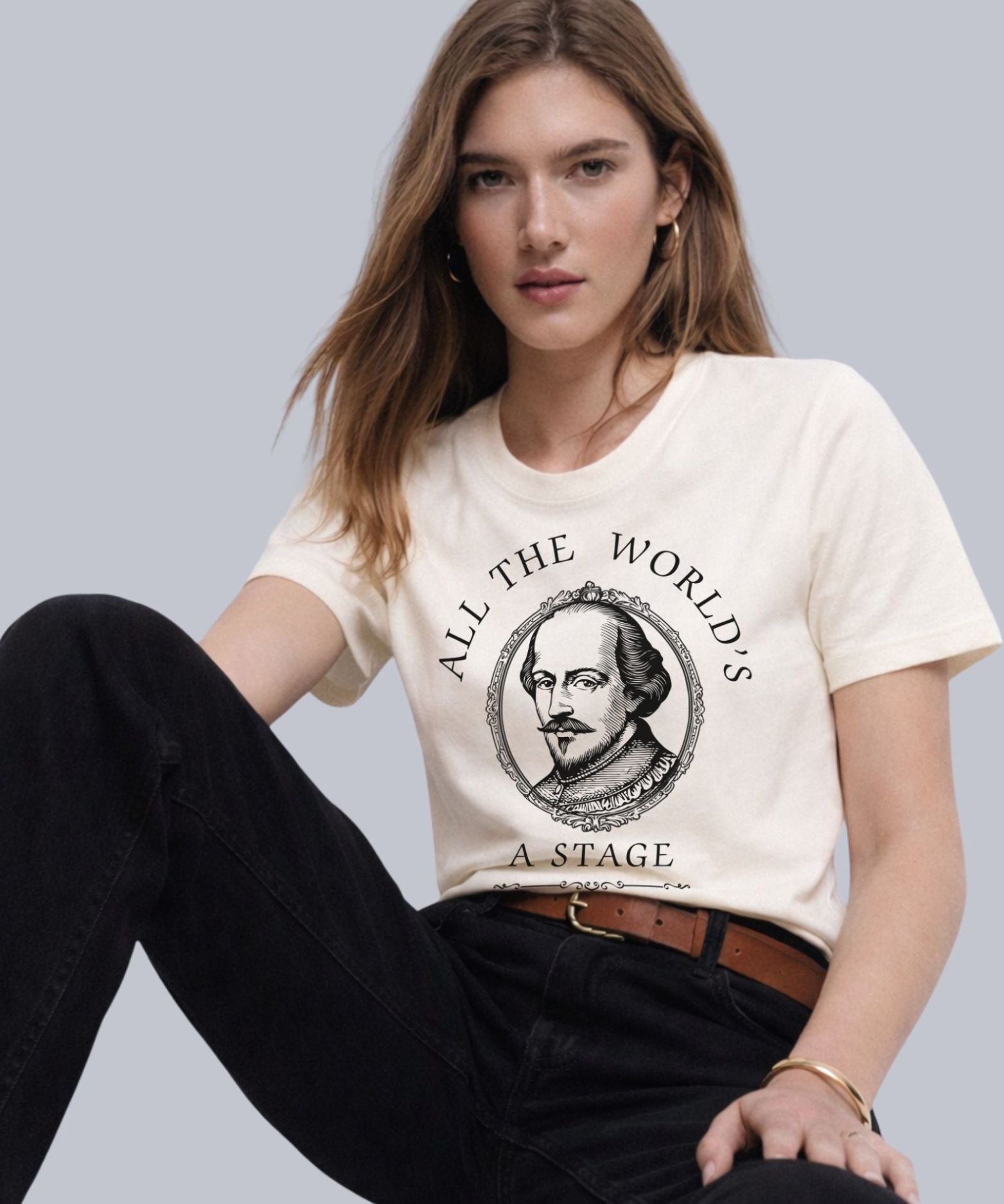 Woman wearing cream All the World’s a Stage Shakespeare quote  graphic t-shirt with vintage portrait design