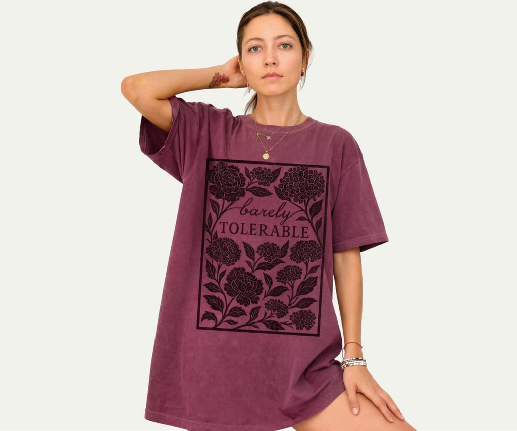 Barely Tolerable Jane Austen shirt on Comfort Colors moss oversized t-shirt dress with floral botanical linocut design for book lovers and Pride and Prejudice fans