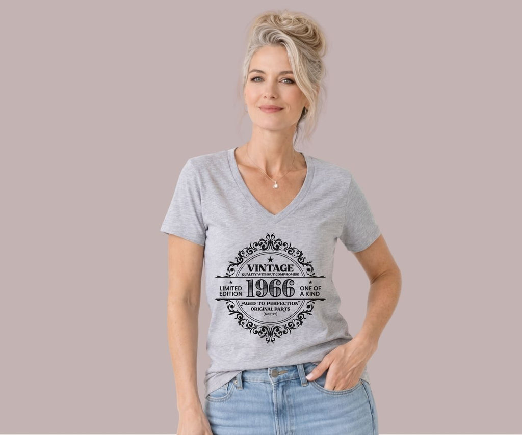 Vintage 1966 limited edition v-neck t-shirt with retro typography design worn by model