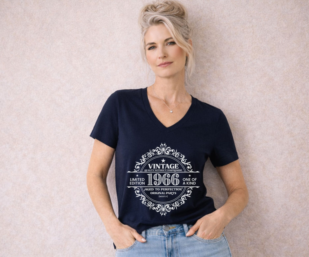 Vintage 1966 limited edition v-neck t-shirt with retro typography design worn by model