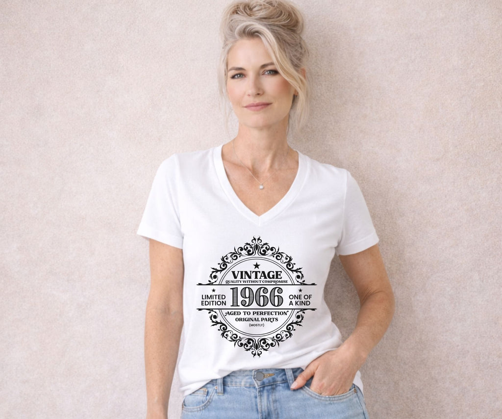Vintage 1966 limited edition v-neck t-shirt with retro typography design worn by model